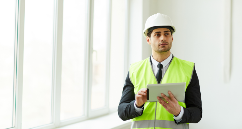 A high-end commercial office space in Abu Dhabi featuring a custom-engineered glass partition and integrated smart lighting, designed by the top engineering consultancy Abu Dhabi.